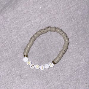 INSPIRE tan beaded bracelet